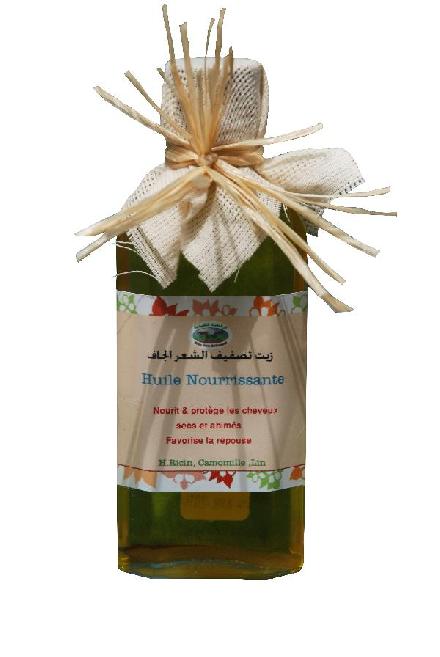  Huile Nourrissante - huiles huile nourrissante- --nourrit,  favorise la repousse et prot&egrave;ge les cheveux secs et ab&icirc;m&eacute;s. enrichie d huile de camomille,  de lin et de ricin.  application sur cheveux propres.----nourishing oil- ----feeds,  favors the regrowth and protects the dry and damaged hair. enriched by oil