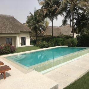  Vente De Deux Villa De Haute Standing - mine terrain concession je vent deux maisons luxe dans un meme domaine &agrave; la baie de boucotte &agrave; la station baln&eacute;aire de cap-skirring s&eacute;n&eacute;gal. ces deux sci propri&eacute;taires des deux villas est de 1.300.000 euros payables en belgique.--- monade 1,  sur un domaine de 2889 m2. villa de 276 