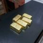 Poudre d'or, lingots d'or et p&eacute;pites d'or en 